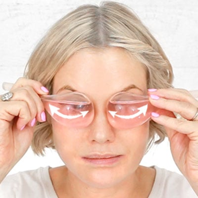 Gently rock globes back & forth over eye sockets