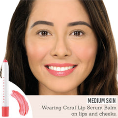 Ruby Hammer Coral Lip Serum Balm on medium skin